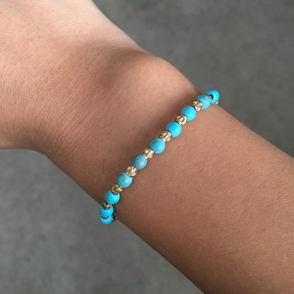 Hand woven beaded bracelet wax cord with bell